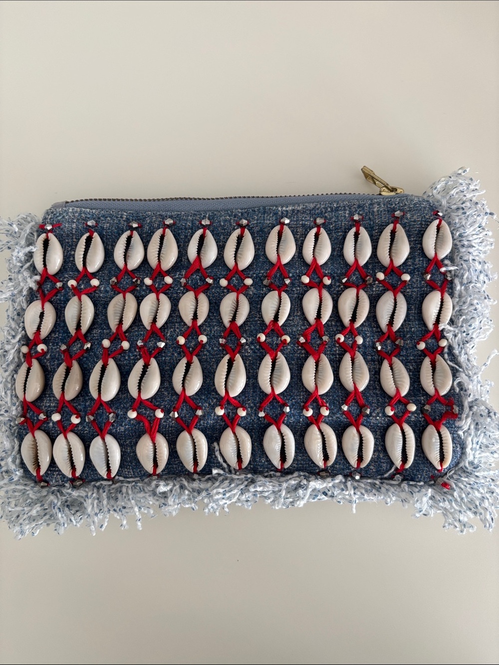 Denim Shell-Embellished Clutch with Red Accents